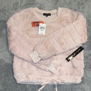 Almost Famous blush colored ladies top